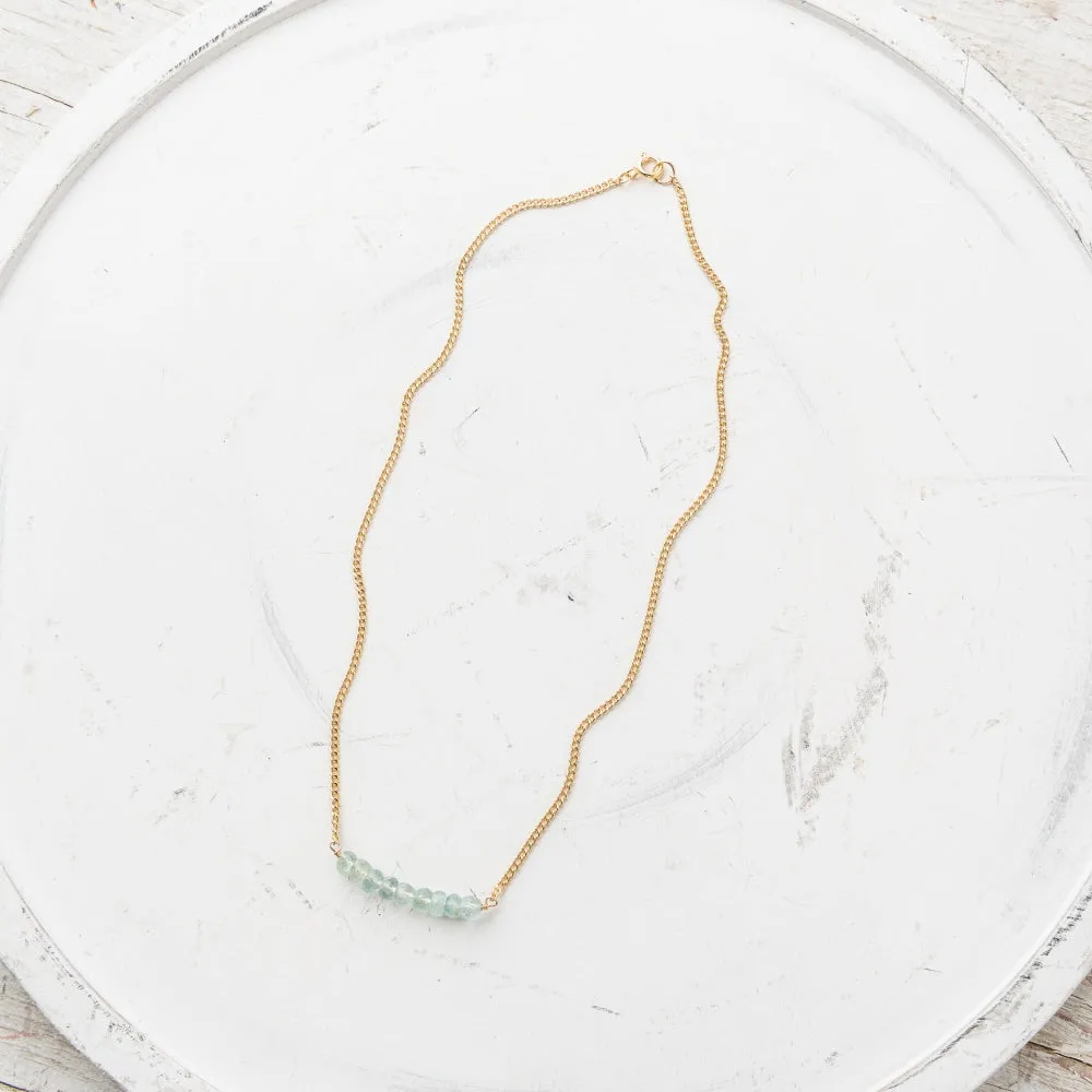 Aquamarine Arch Necklace on Gold Curb Chain