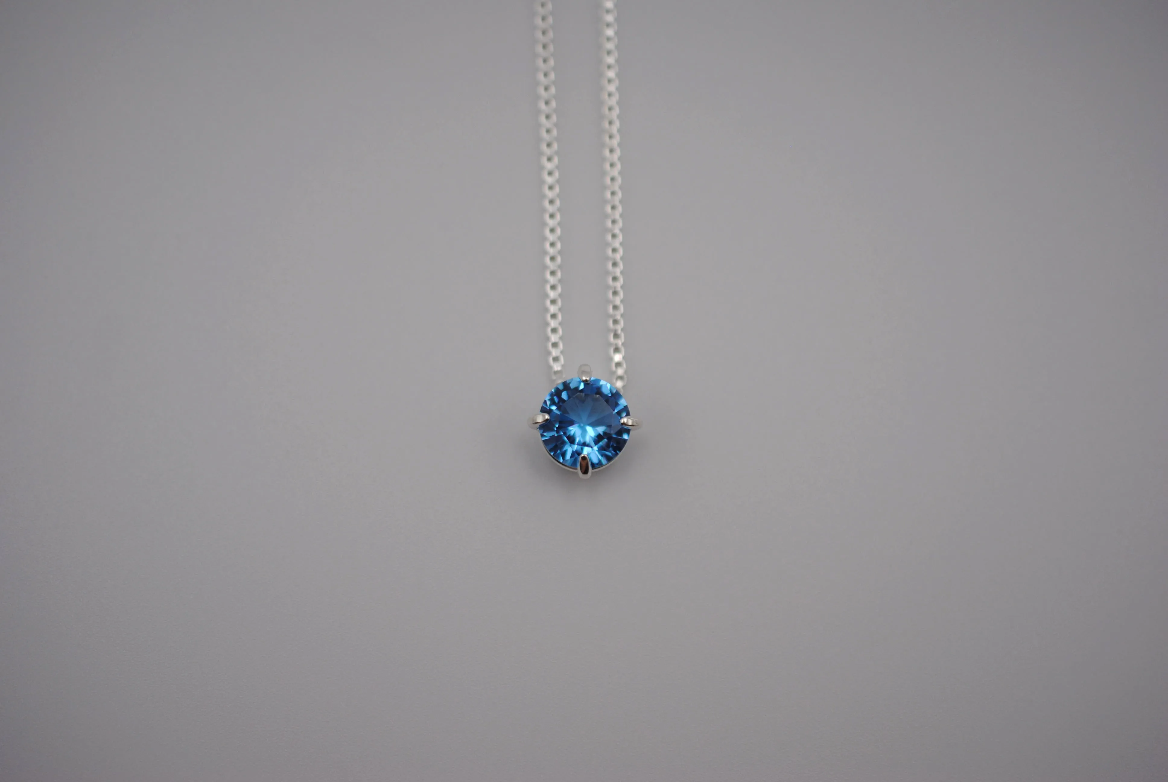 Birthstone Necklace: Round Aquamarine, Silver Prongs, Adjustable Chain