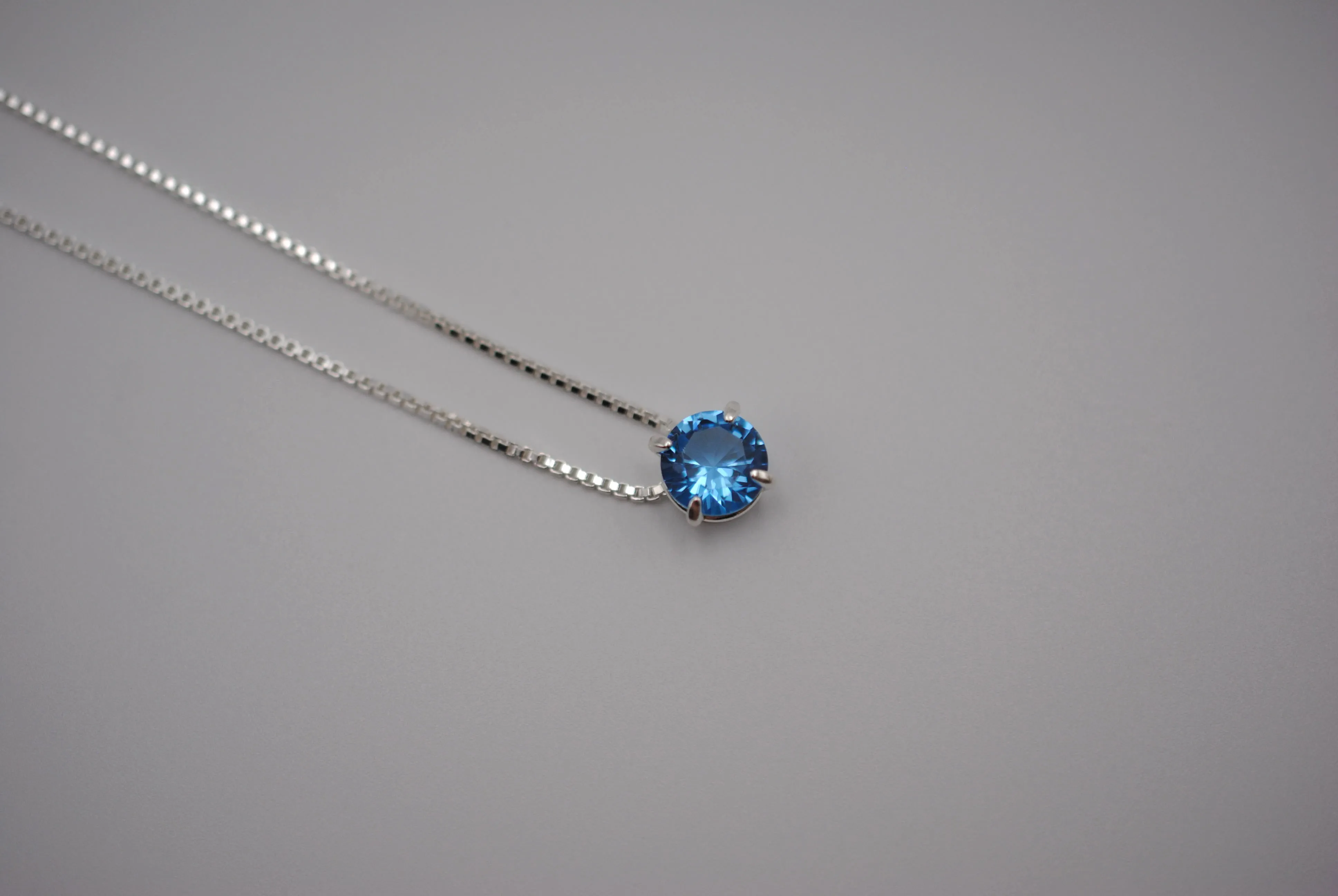 Birthstone Necklace: Round Aquamarine, Silver Prongs, Adjustable Chain