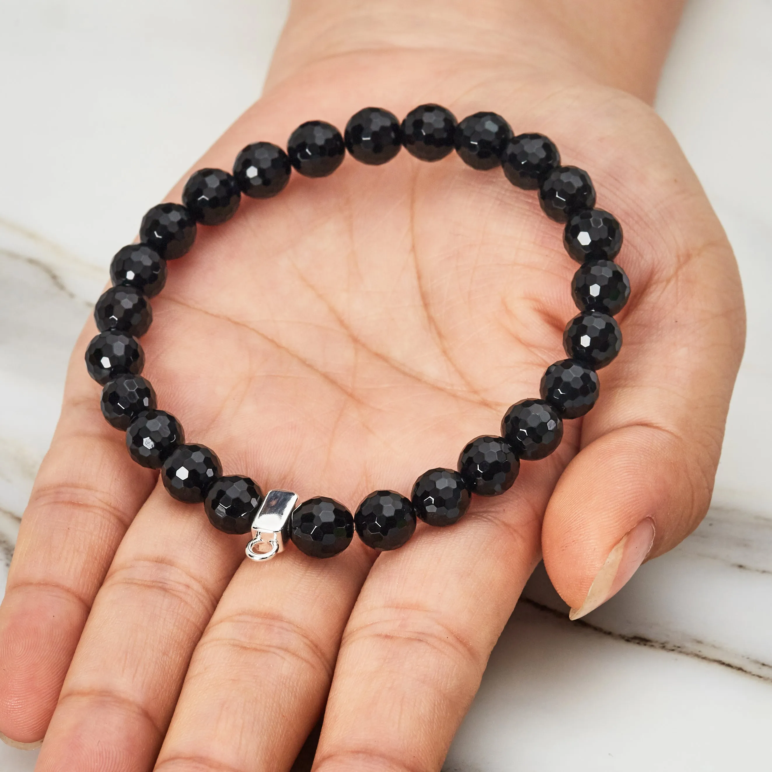Faceted Black Onyx Gemstone Stretch Bracelet with Charm Created with Zircondia® Crystals