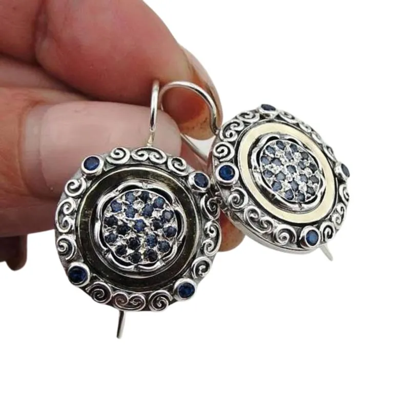 Oriental style silver and gold dangle earrings, decorated with blue Zircon