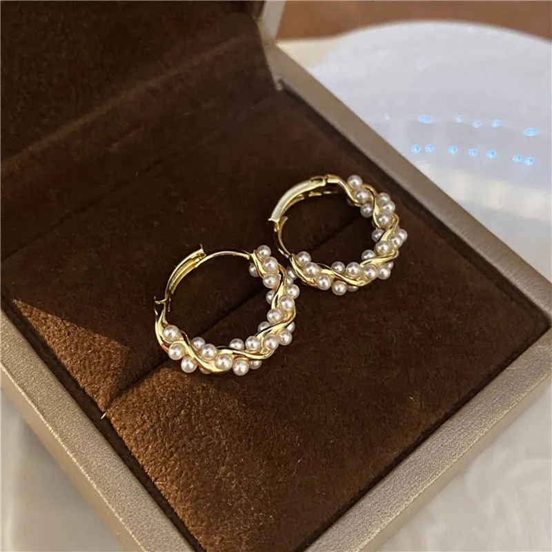 Silver needle circle pearl earrings for women spring and summer new niche temperament retro light luxury high-end design earrings
