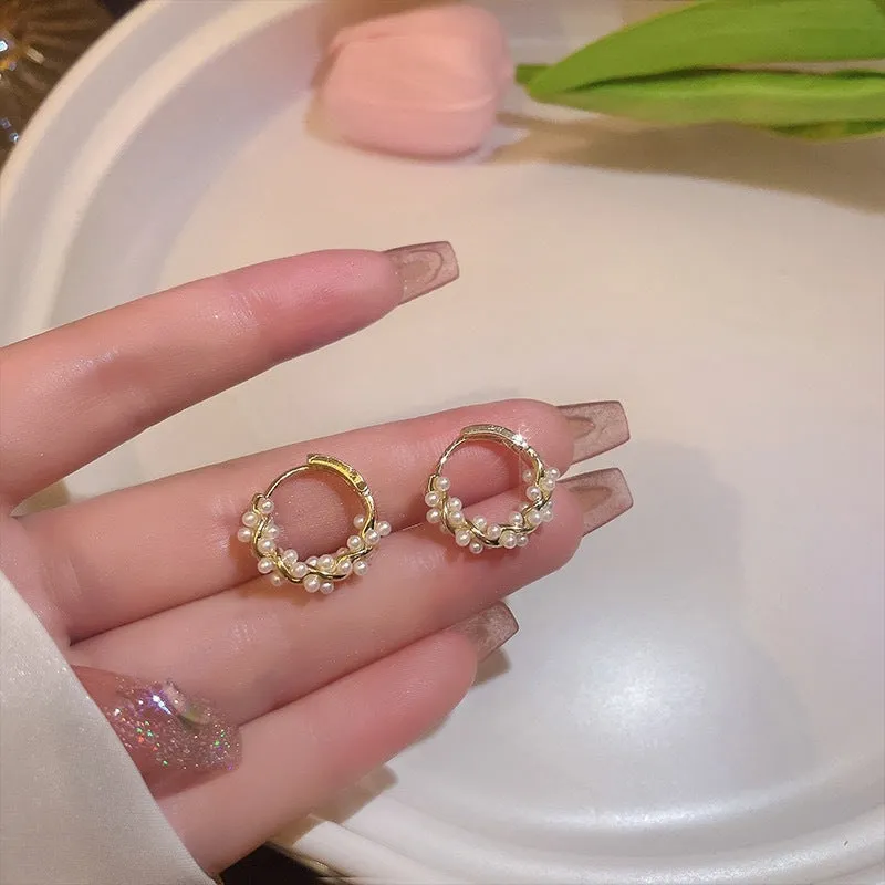 Silver needle circle pearl earrings for women spring and summer new niche temperament retro light luxury high-end design earrings