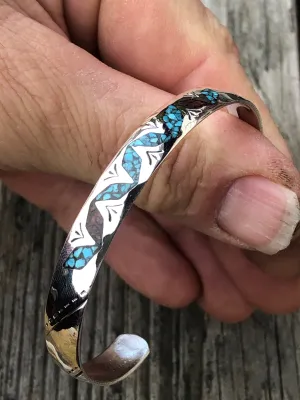 Silver stamped bracelet with Coral and Turquoise chip inlay